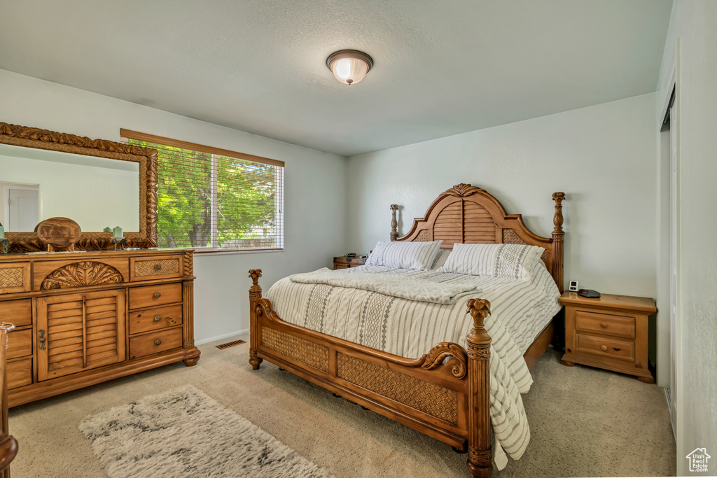 Bedroom featuring carpet