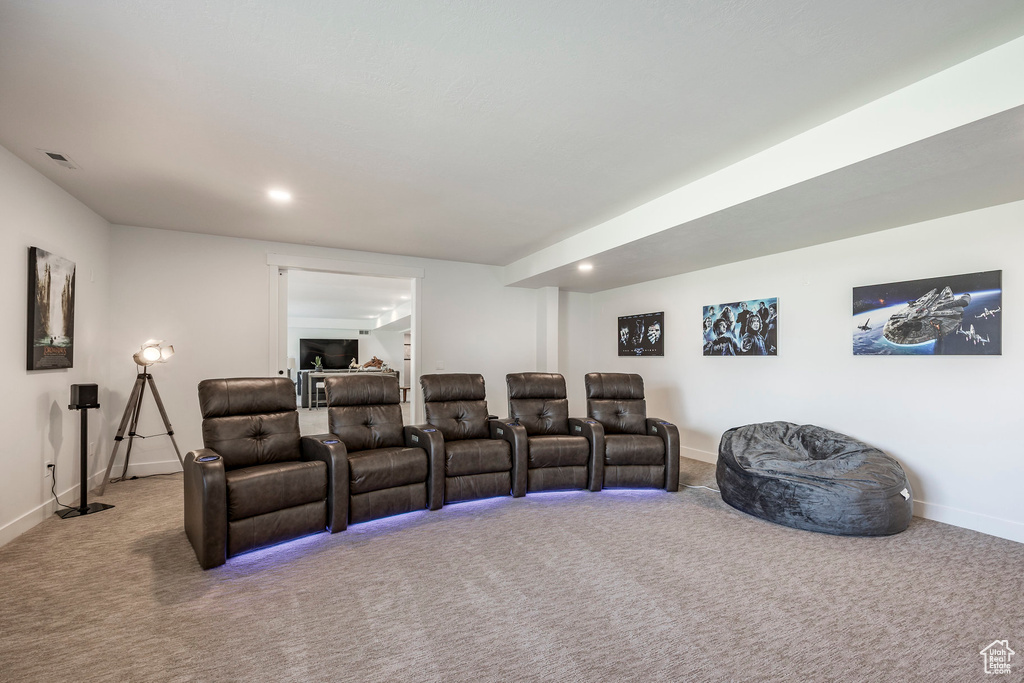 Cinema with carpet flooring, baseboards, and recessed lighting