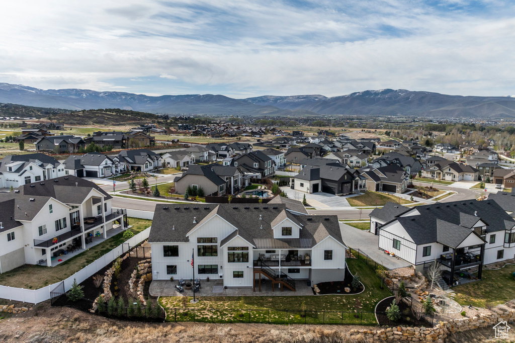 Aerial view of residential area with mountains
