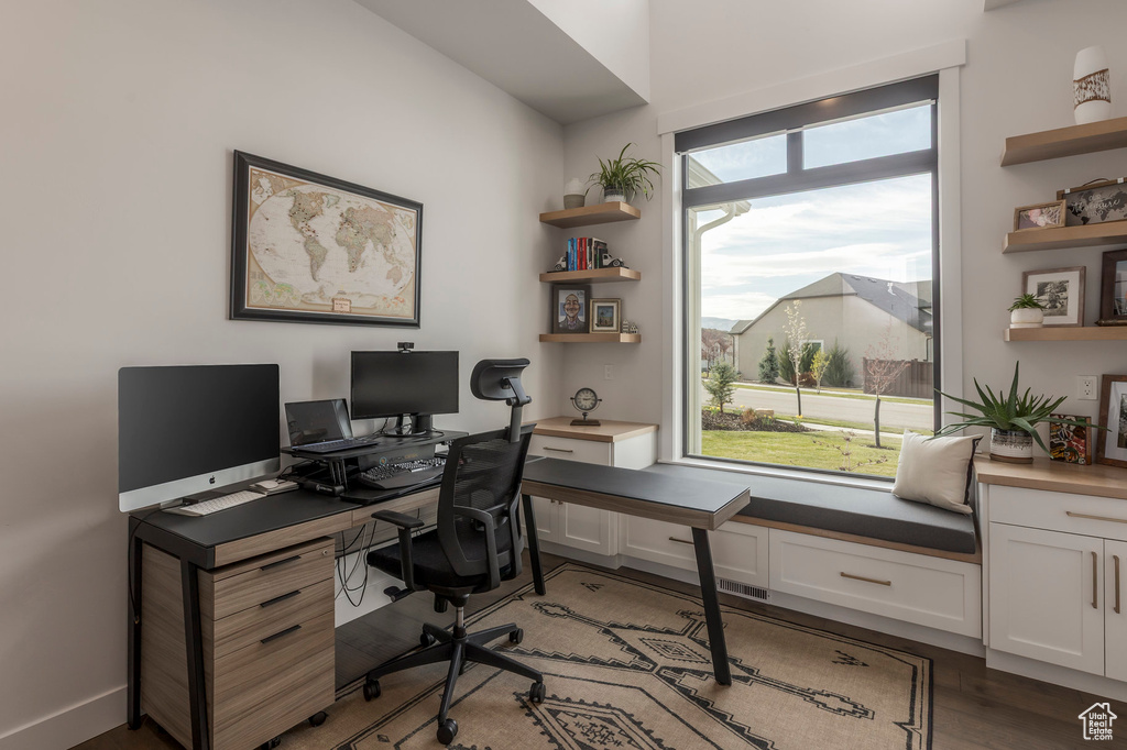 Office area with wood finished floors