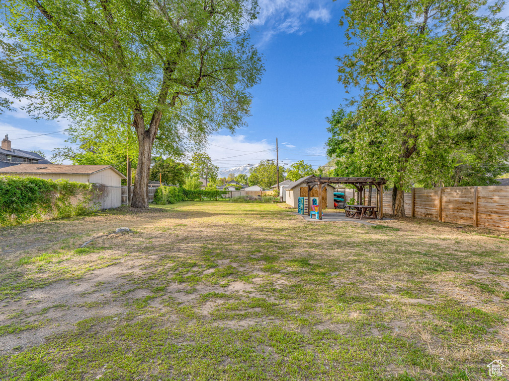 View of fenced backyard