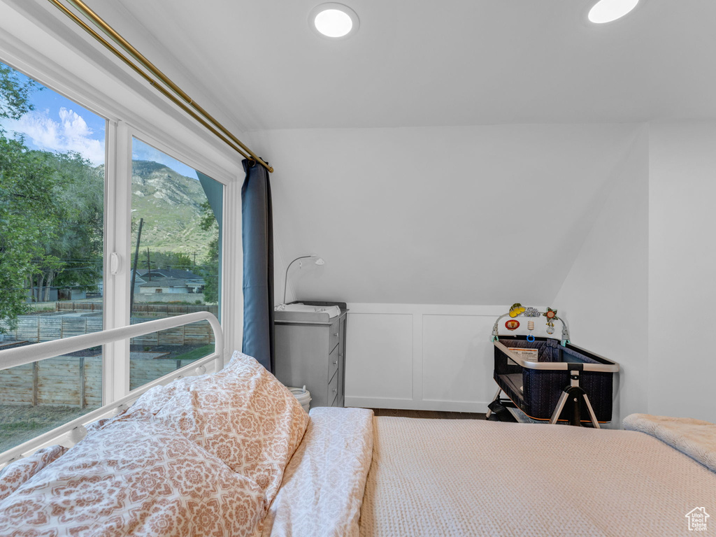 Bedroom with a decorative wall
