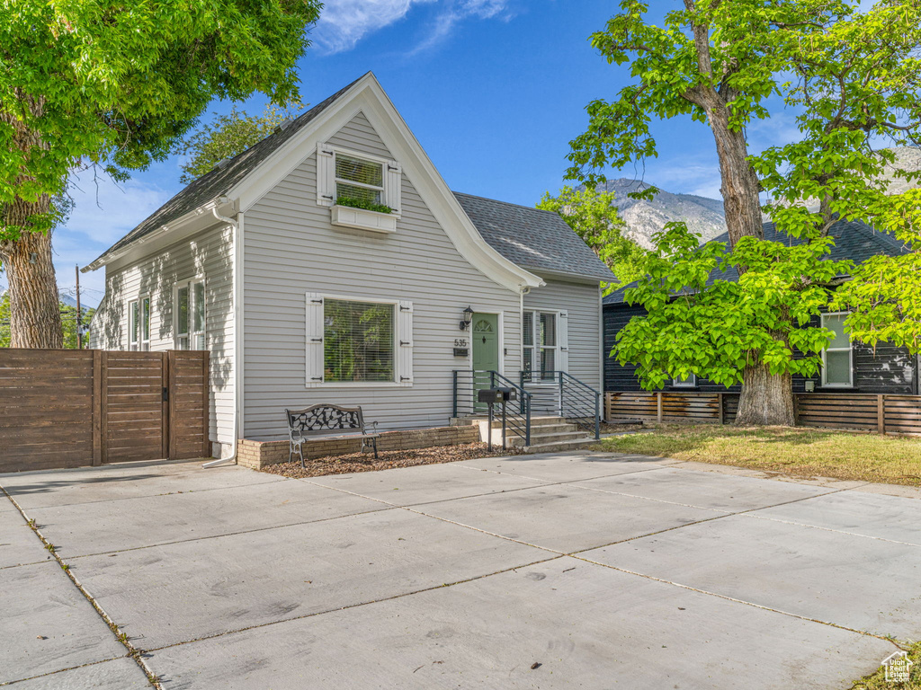 View of front of house with a mountain view