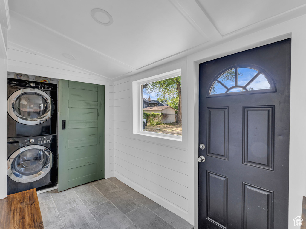Laundry area with estacked washer and dryer