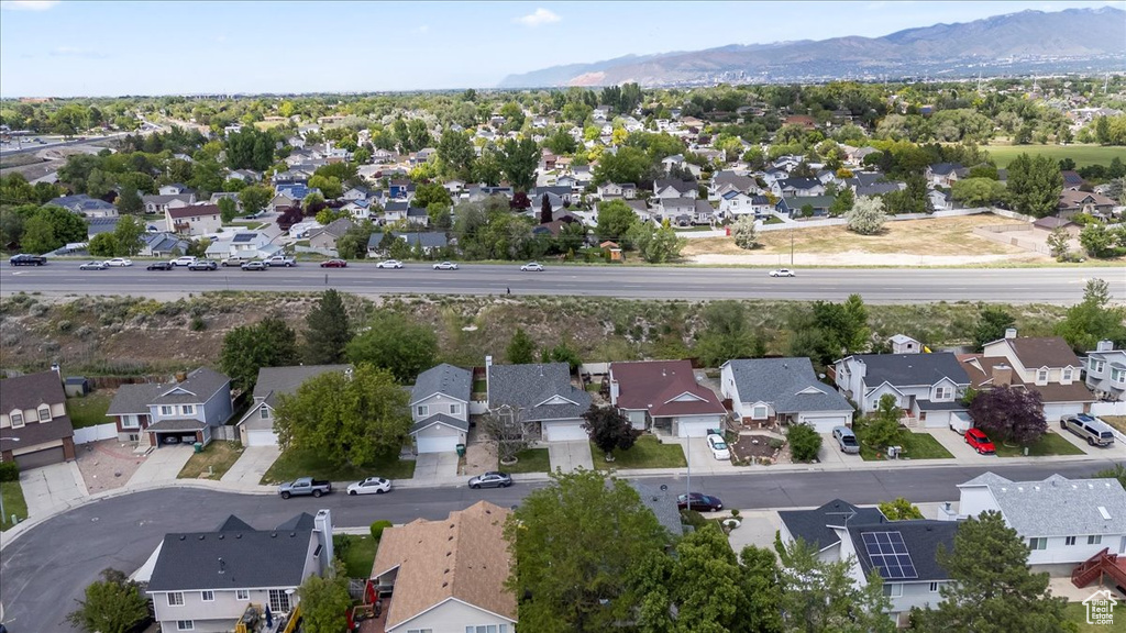 Aerial view of residential area with a mountainous background