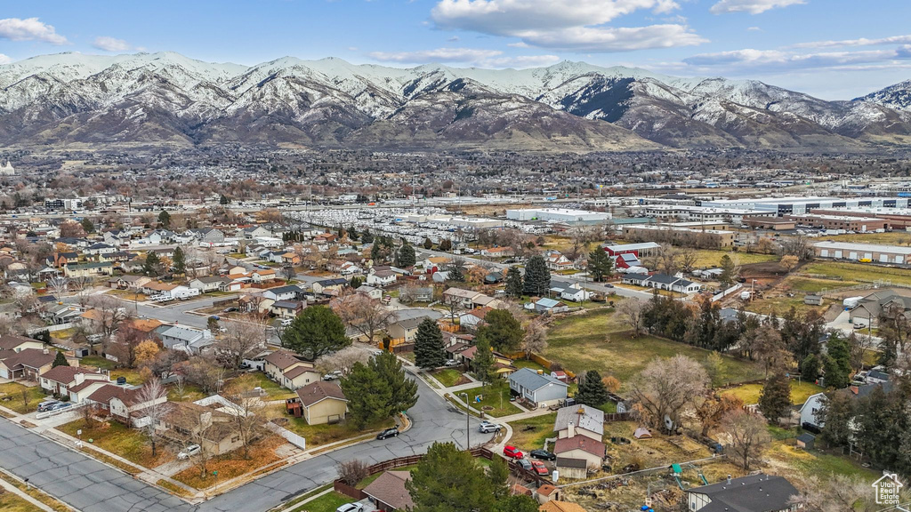 View of mountain backdrop with nearby suburban area