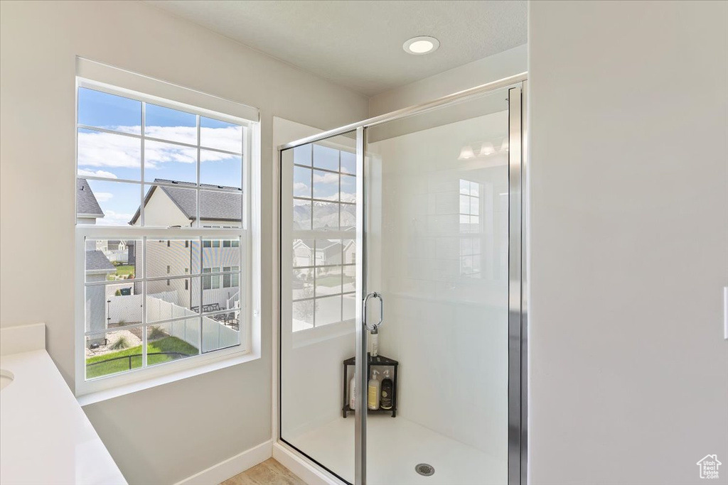 Full bath featuring a stall shower