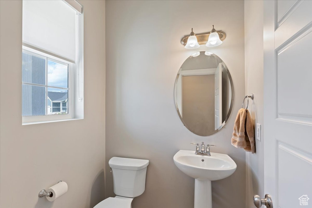 Bathroom featuring toilet and a sink