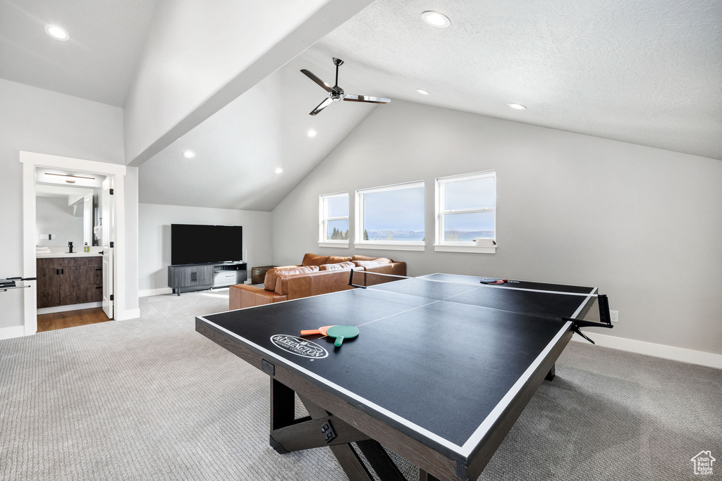 Game room featuring carpet flooring, ceiling fan, recessed lighting, baseboards, and vaulted ceiling