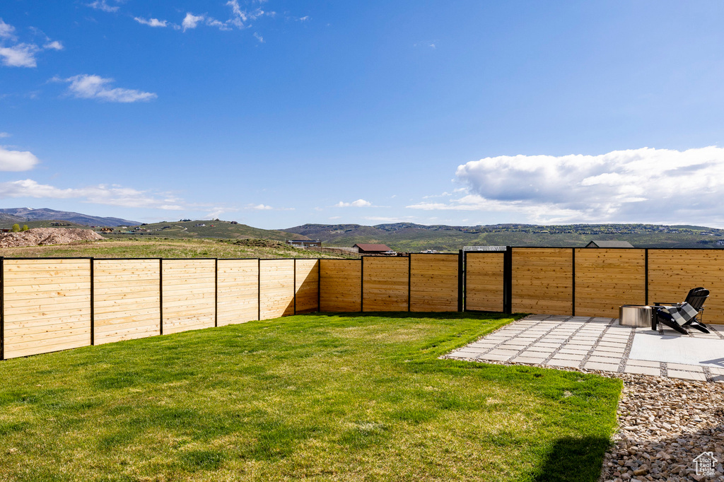 View of yard with a mountain view