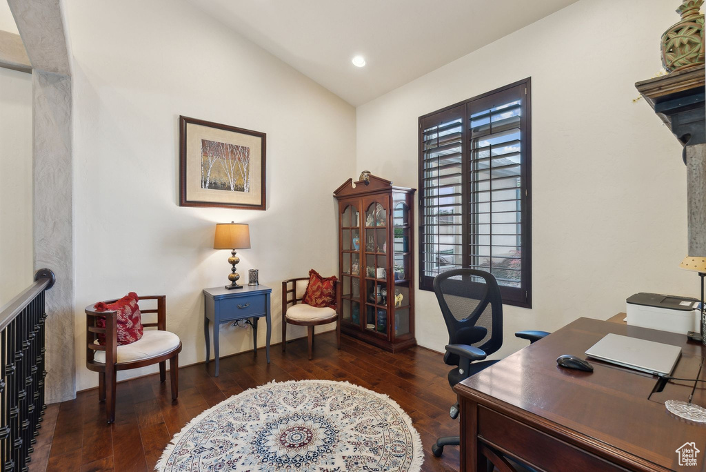 Office space with hardwood / wood-style floors, lofted ceiling, and recessed lighting