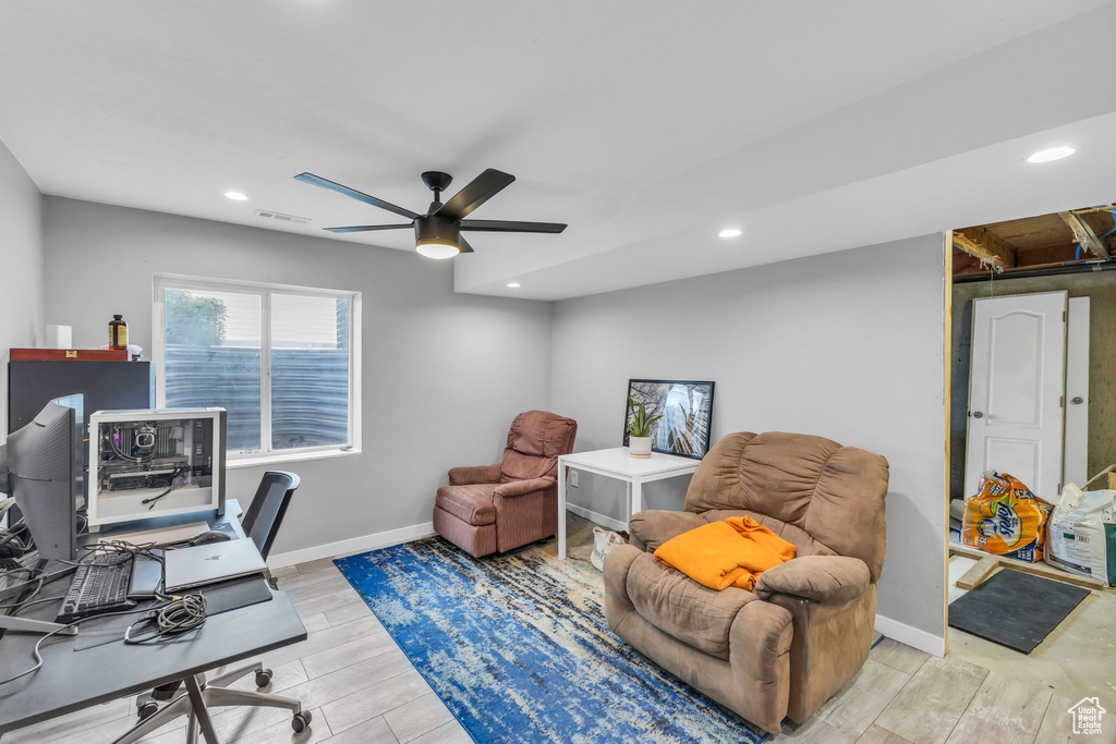 Office featuring a ceiling fan, light wood-style flooring, baseboards, and recessed lighting