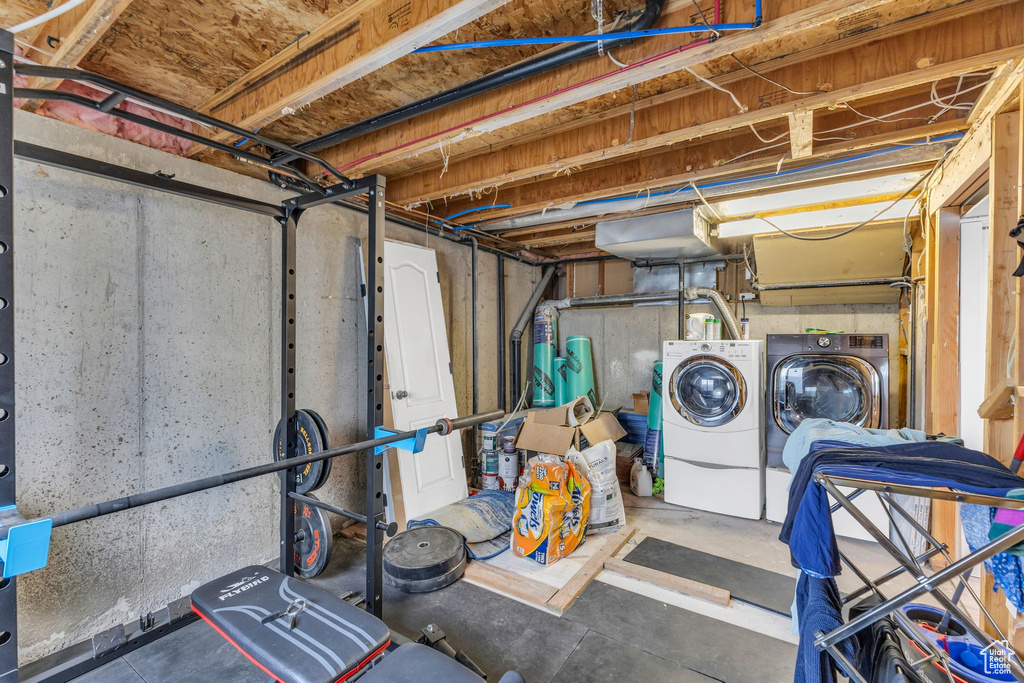 Unfinished basement with washer and dryer