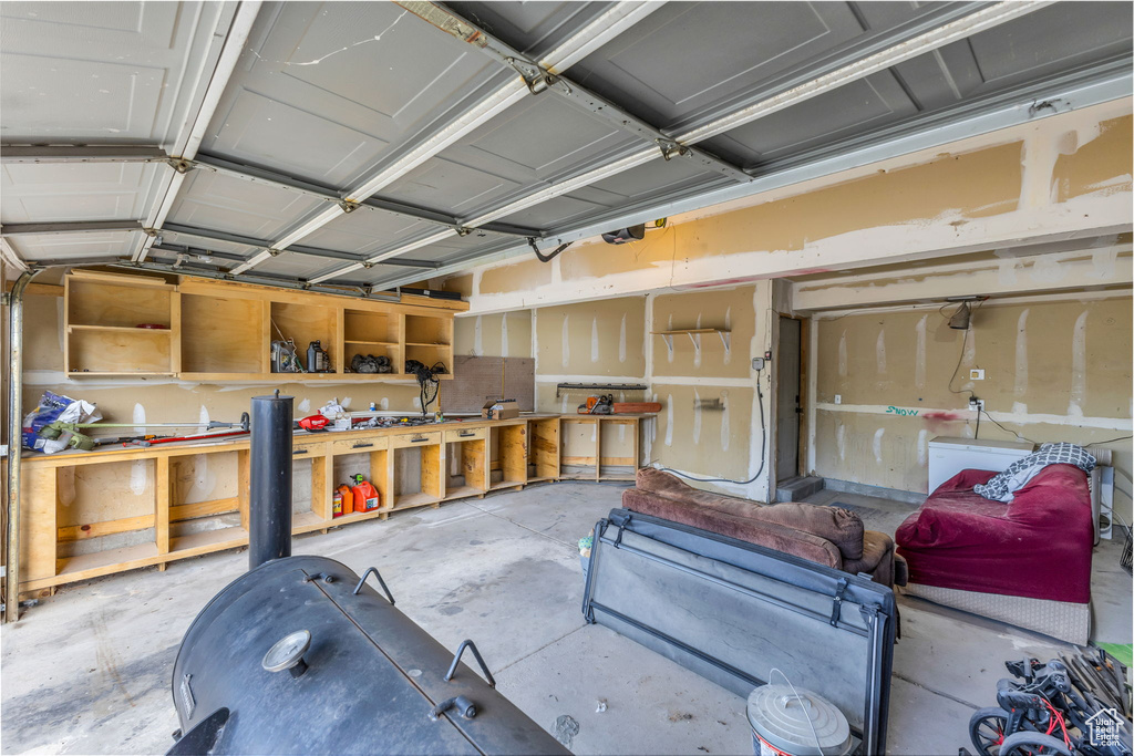 Garage featuring a workshop area