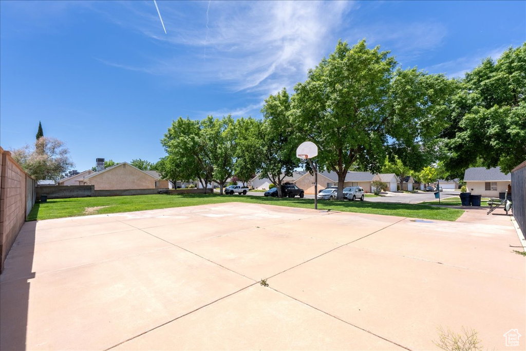 View of sport court with community basketball court and a residential view