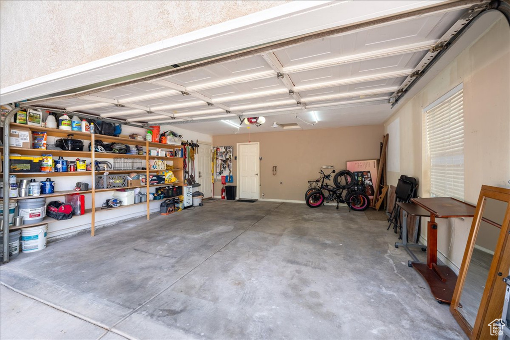 Garage featuring a garage door opener