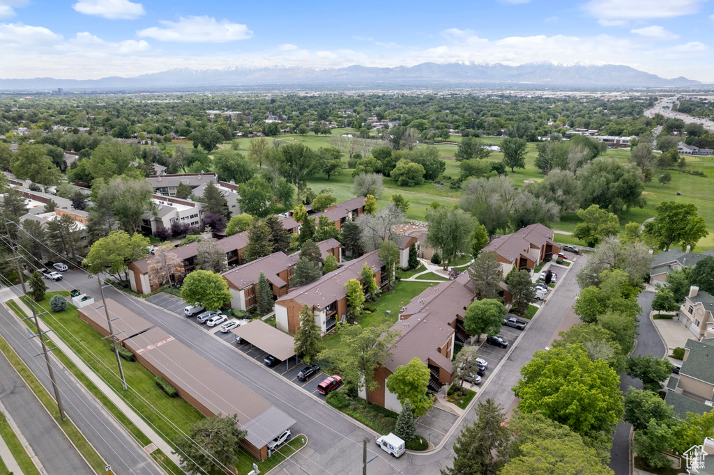 Aerial view of residential area with a mountainous background