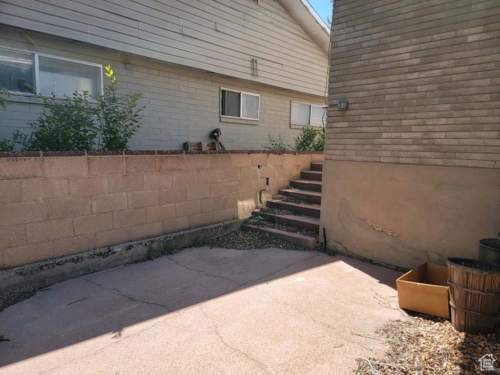 View of patio / terrace featuring stairs
