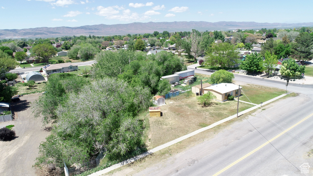 Aerial view of residential area with a mountain backdrop