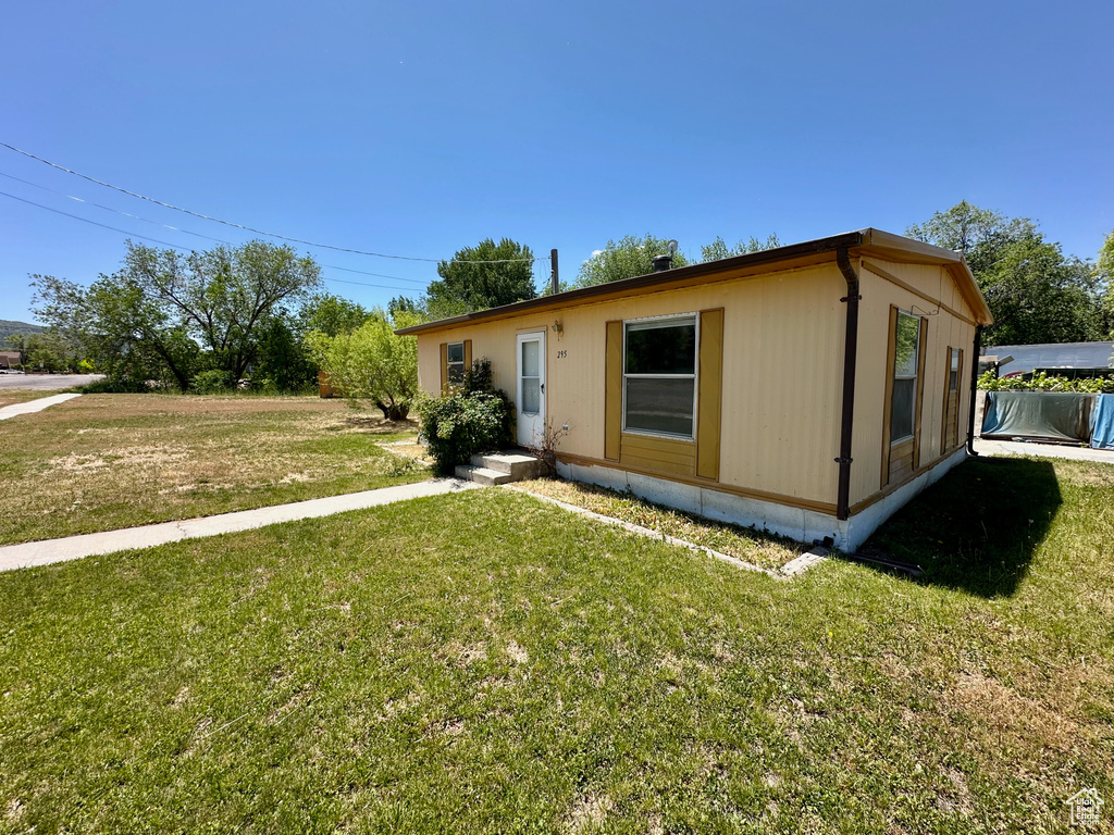 View of front of house with a front lawn