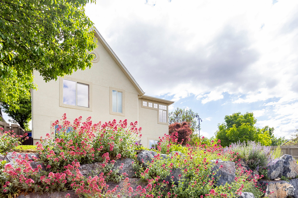 View of side of property with stucco siding