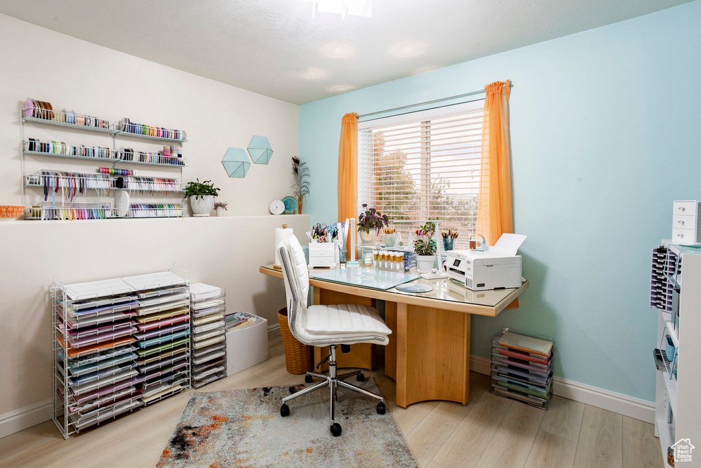 Office area featuring wood finished floors and baseboards