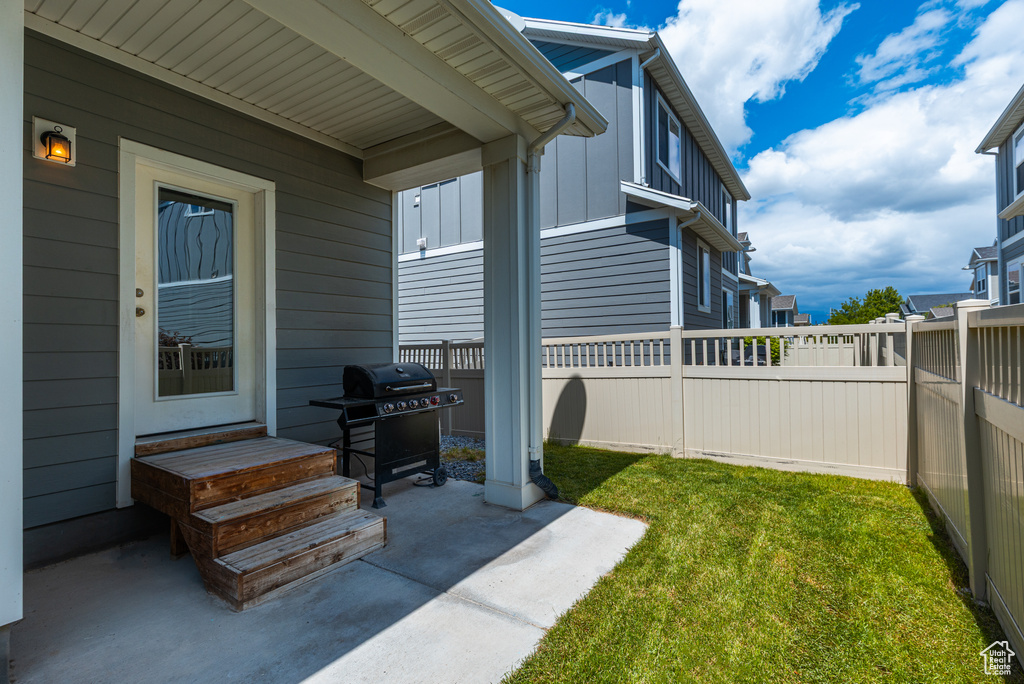 View of yard with a patio area