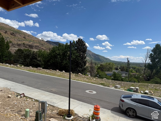 View of asphalt road featuring a mountain view