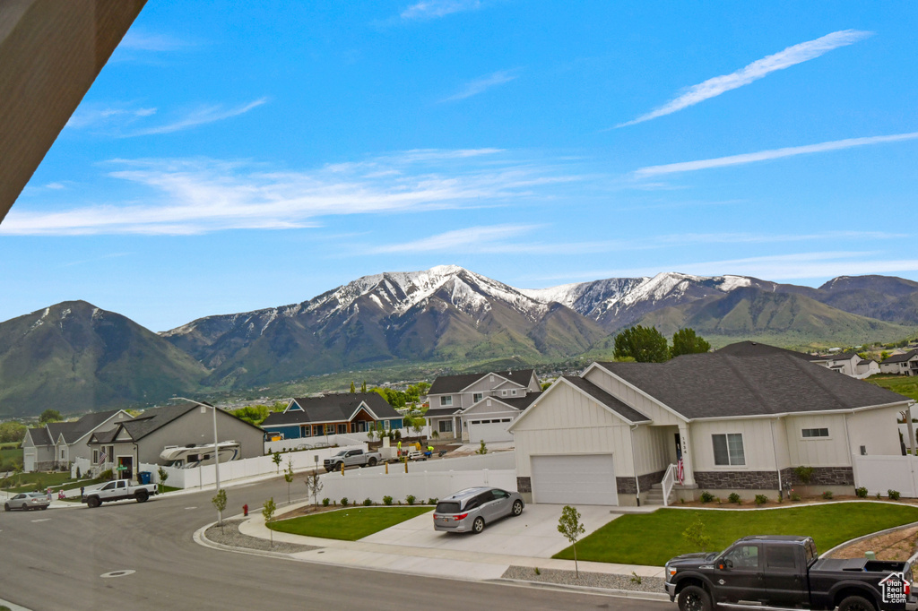 View of mountain background featuring nearby suburban area