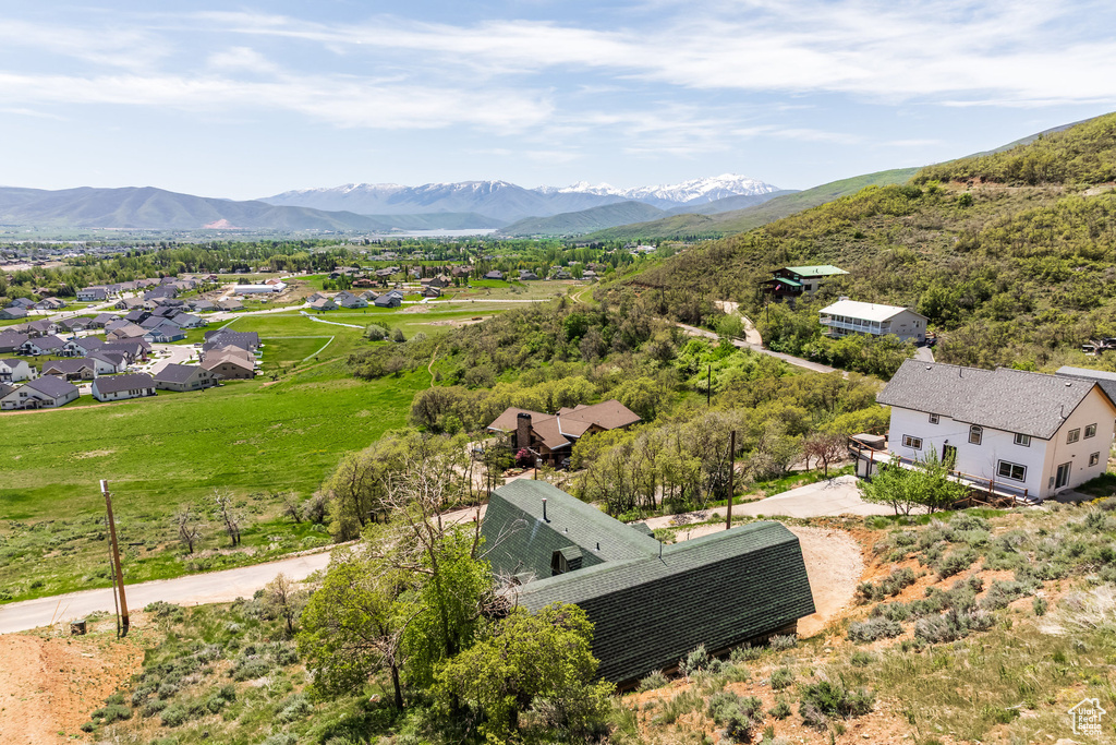 Aerial view of residential area with a mountainous background