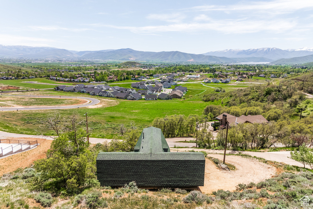 View of mountain background featuring nearby suburban area