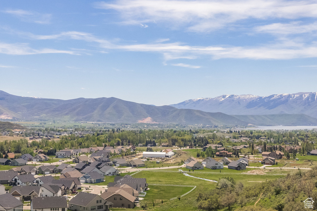 View of mountain backdrop with nearby suburban area