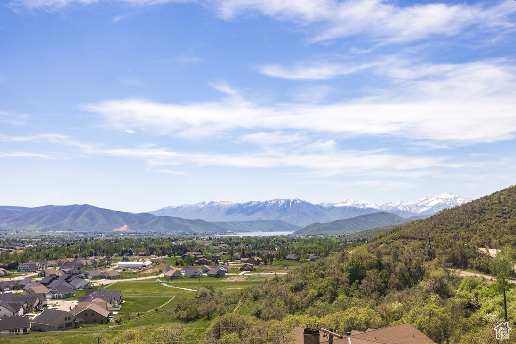 View of mountain background featuring nearby suburban area