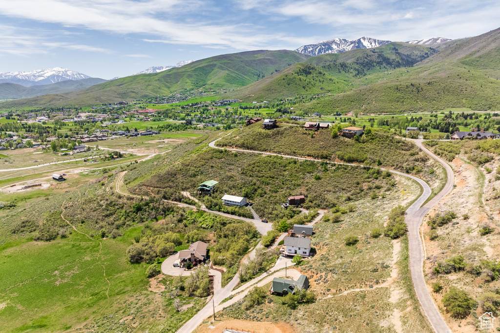 Aerial view of sparsely populated area with mountains