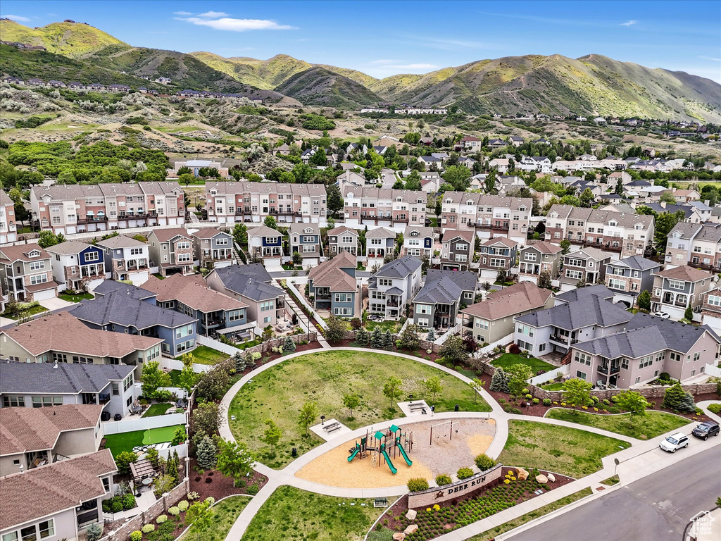 Aerial view of residential area with mountains