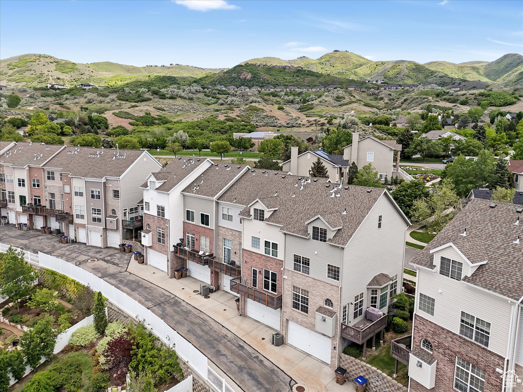 Aerial perspective of suburban area with mountains