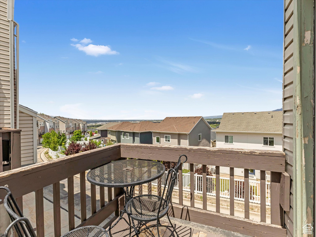 Balcony featuring a residential view