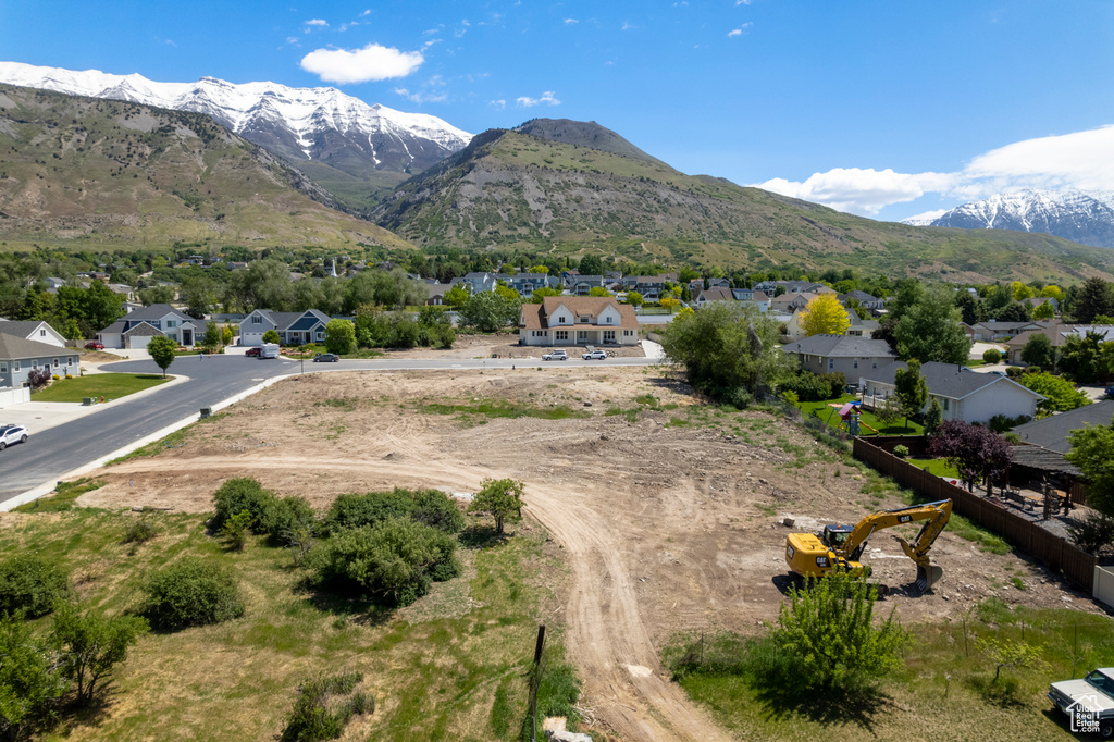 View of mountain background featuring nearby suburban area