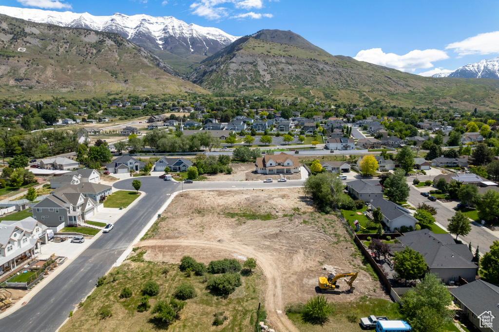 Aerial view of residential area featuring mountains