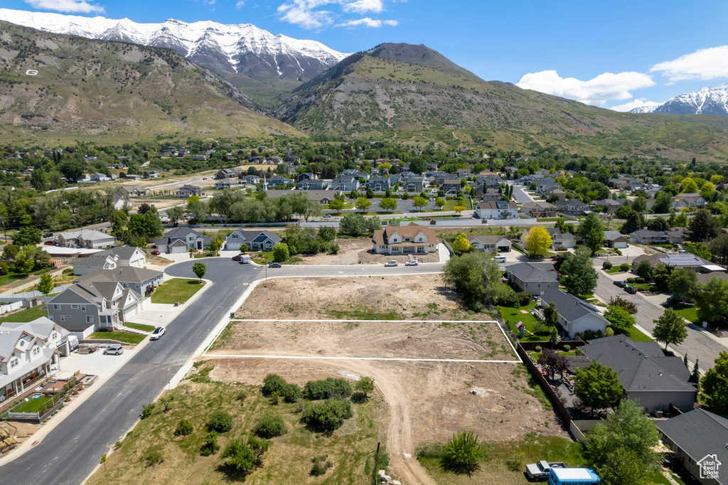 Aerial view of residential area featuring mountains