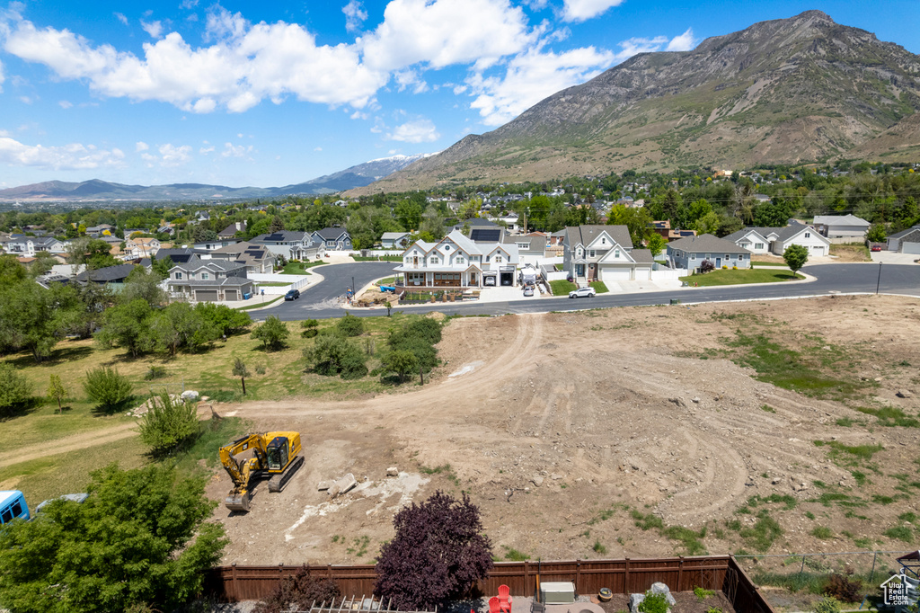 View of mountain background featuring nearby suburban area