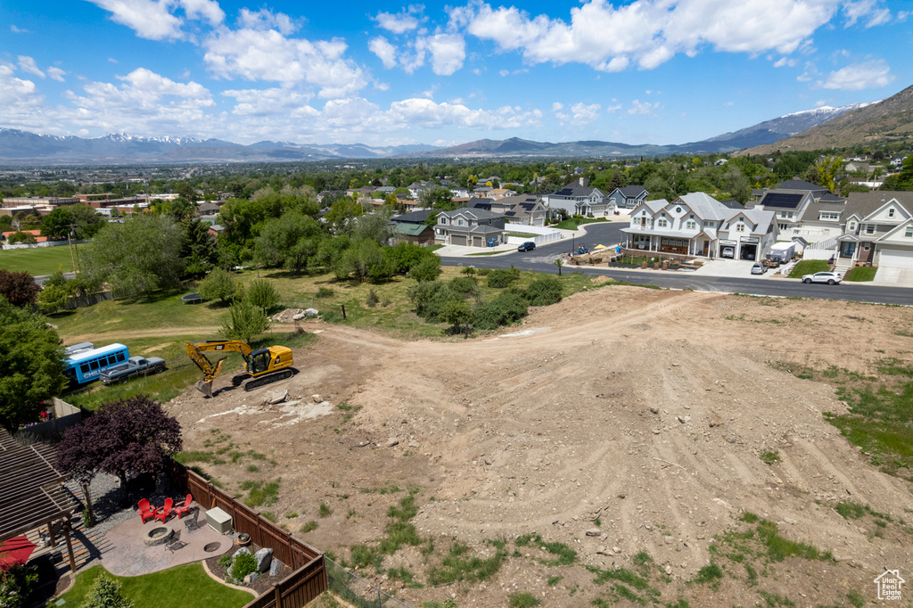 Aerial view of residential area with mountains