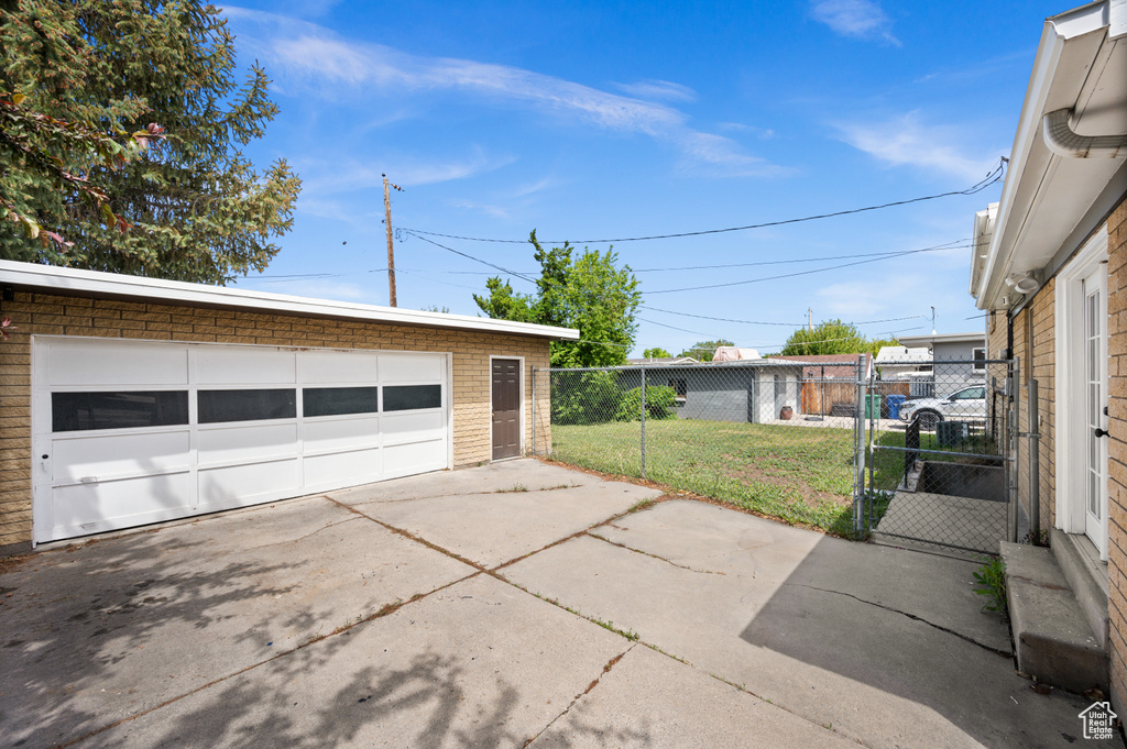 Detached garage with a gate