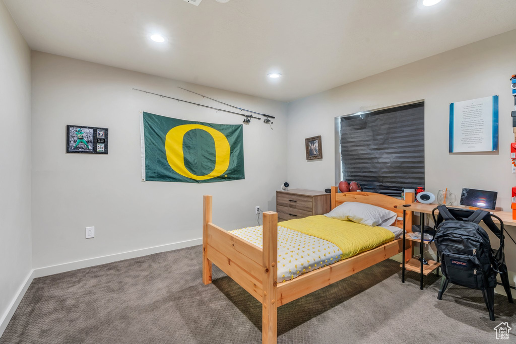 Bedroom with carpet flooring, recessed lighting, and baseboards