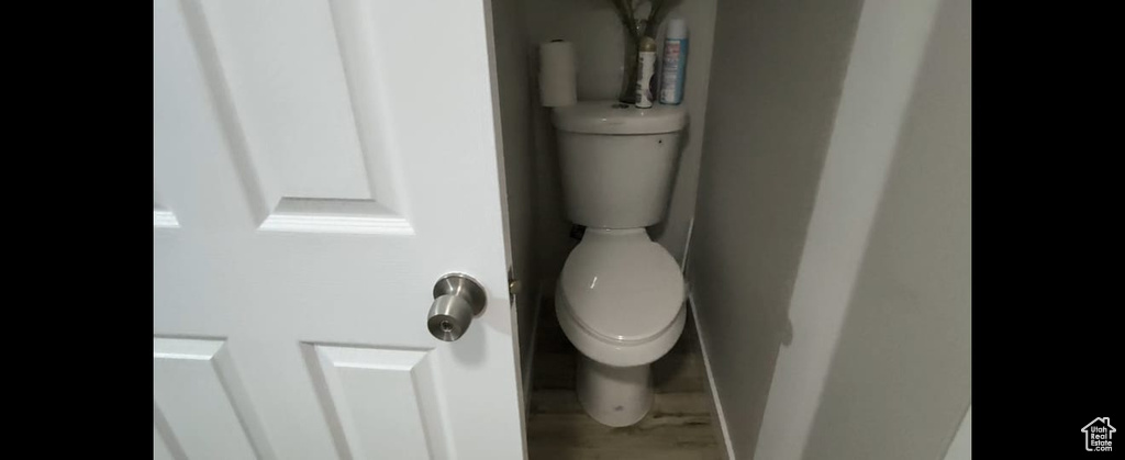 Bathroom view of toilet and baseboards