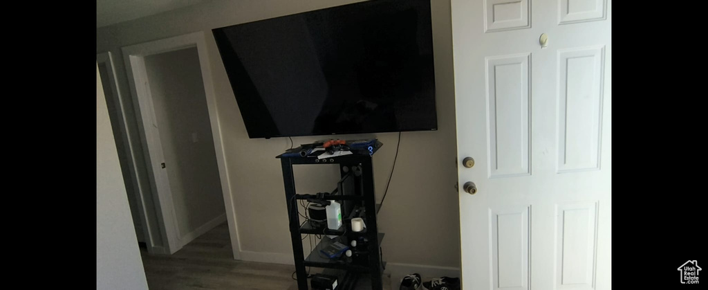 Detailed view of wood finished floors and baseboards