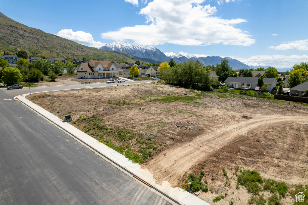 Mountain view featuring nearby suburban area