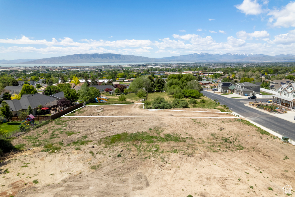 Aerial view of residential area with a mountainous background
