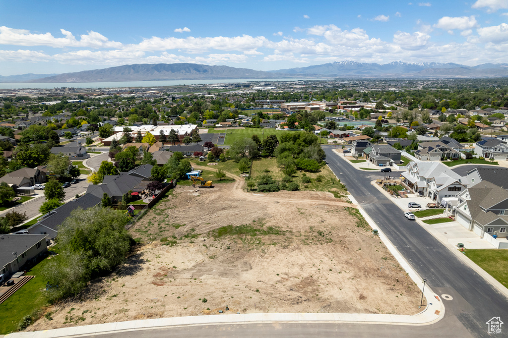 Aerial view of residential area with a mountain backdrop