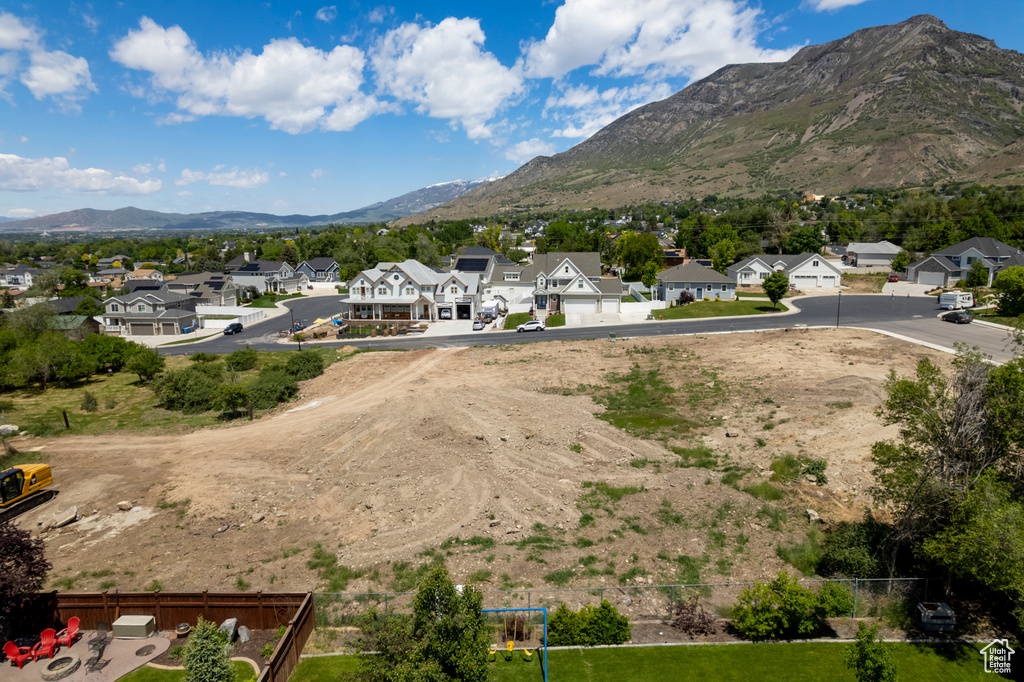 View of mountain backdrop with nearby suburban area